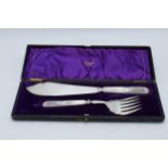A cased set of Walker and Hall of Sheffield fish servers (2). In good condition though one hinge