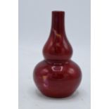 Bernard Moore double gourd vase with oxblood red glaze. 14cm tall. Initials to base. In good
