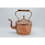 Victorian copper kettle with brass acorn finial. Generally in good clean condition with some dents