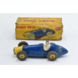 Boxed Dinky Toys Ferrari Racing car No. 234 in dark blue with yellow front and wheels with grey