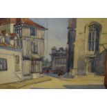 A trio of paintings to include a framed watercolour of a street scene signed by K V Hutchinson. 64 x