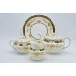 A collection of Minton bone china tea ware in the Dynasty pattern to include a teapot, milk jug