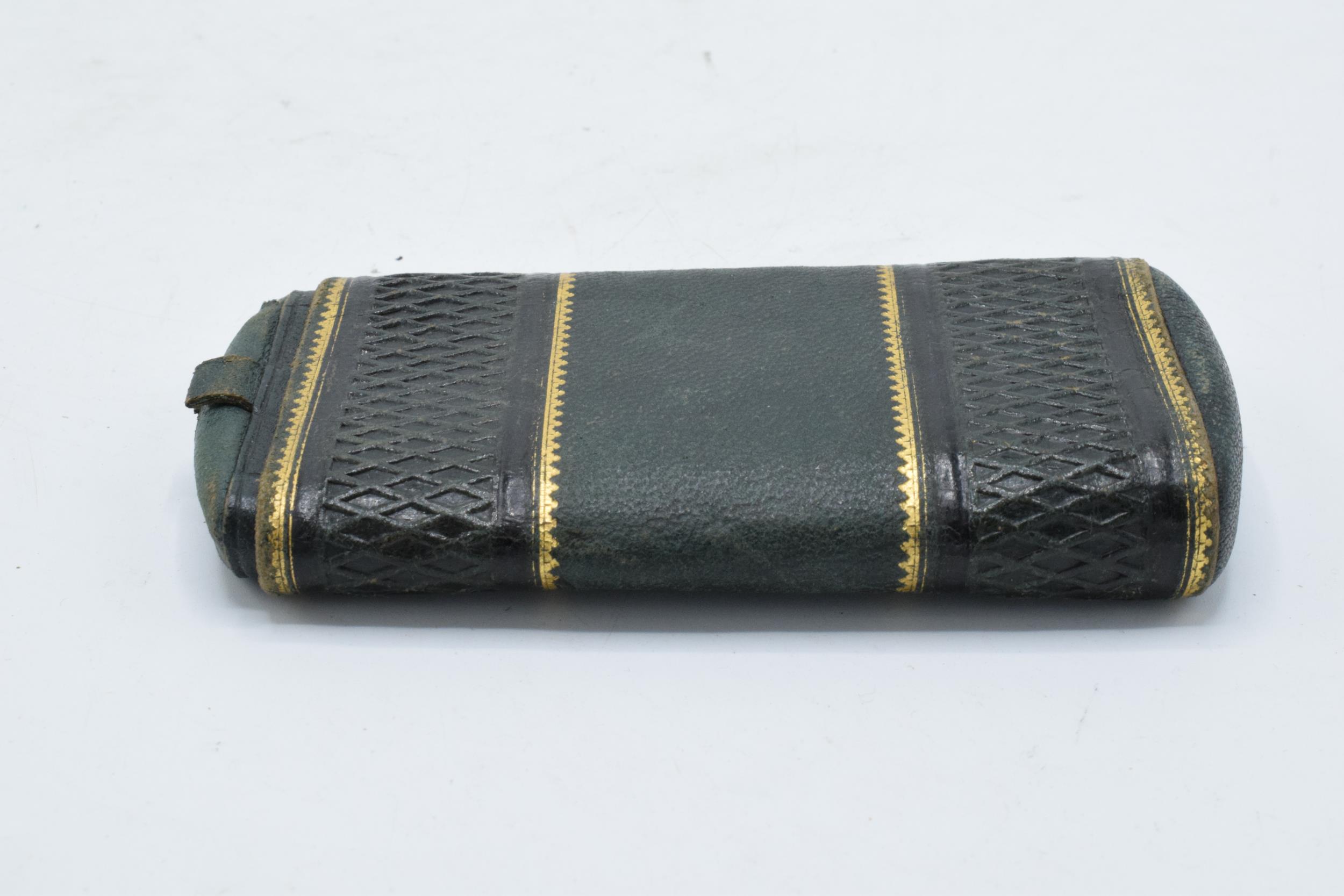 A 19th century green leather cigar case with gilt decoration. 13cm tall. - Image 2 of 3