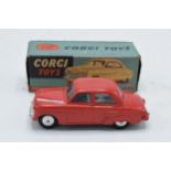 Boxed Corgi 203M Mechanical Vauxhall Velox Saloon diecast model in red. Box in good condition as