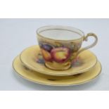 Aynsley Orchard Gold trio consisting of a cup, saucer and side plate (3). Cup signed by N Brunt, the