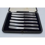 A cased set of 6 silver-handled knives (6). Sheffield.