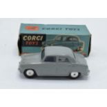 Boxed Corgi Toys 201M Austin Cambridge saloon mechanical in grey. GC condition with some minor chips