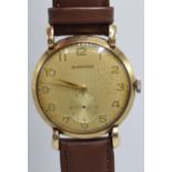 9ct gold Garrad Gents wrist watch c1920s,17 jewel swiss movement engraving to reverse,
