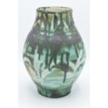 A large bulbous 20th century studio pottery stoneware vase with drip decoration and mottled