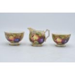A trio of Aynsley Orchard Gold items to include a small milk jug and 2 small sugar bowls (3). In
