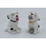 A pair of Grafton China Swains Studdy Series Bonzo dog figures, one with ball and the other is