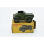 Boxed Dinky Toys 673 Scout Car. In good condition with some evidence of use and play-wear such as