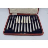 A cased set of 6 silver handled forks and 6 silver handled knives (12) Sheffield 1919.