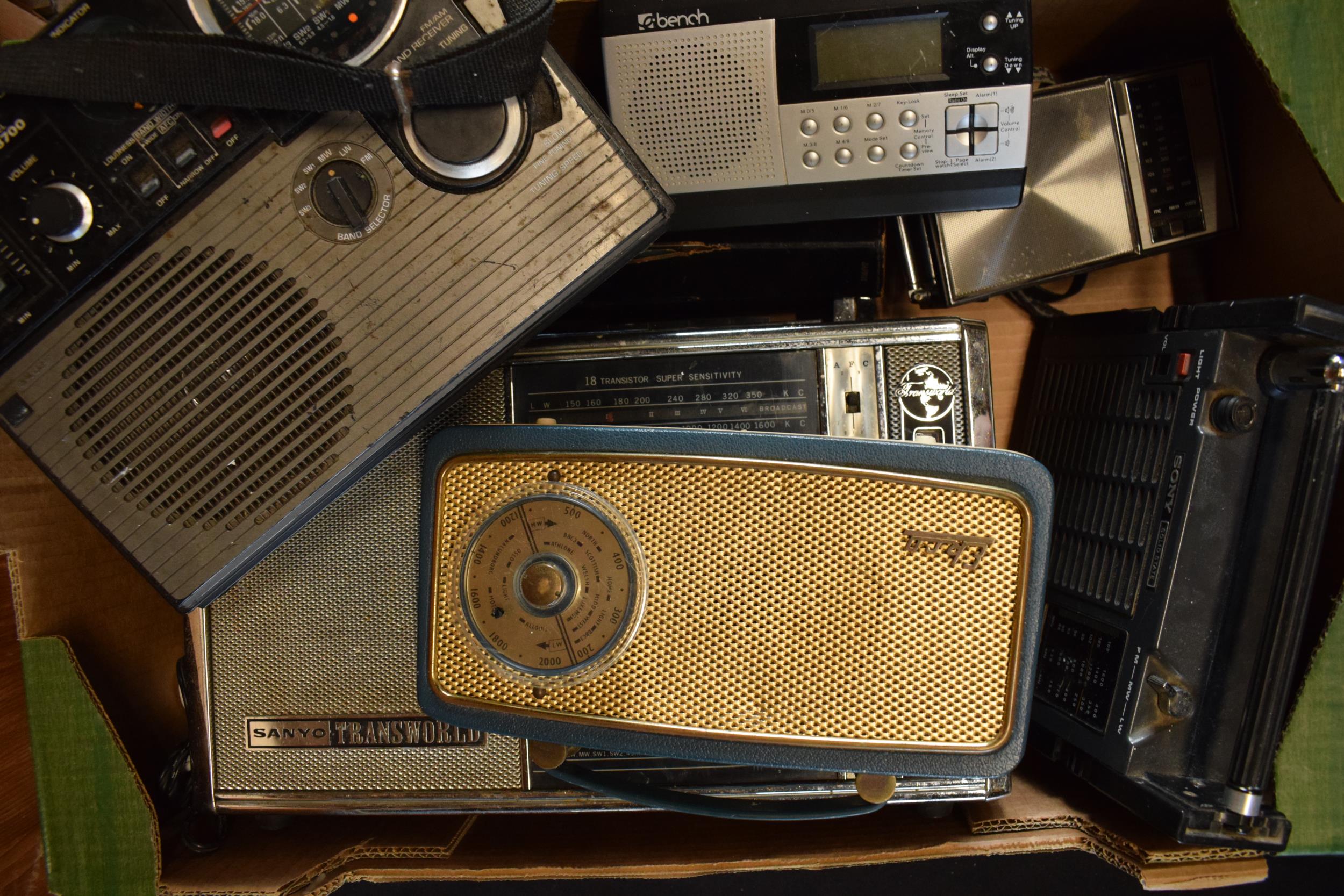 A mixed collection of radios and similar items to include Ekco example, Sanyo Transworld, Sanyo RP