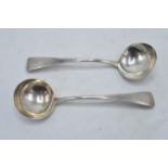 A near pair of Georgian silver ladles. London 1817 and London 1820. 100.5 grams / 3.23 oz.