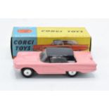 Boxed Corgi Toys No. 214 Ford Thunderbird saloon comprising of pink body with black hood and spun