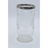 A cut glass vase with a silver rim Sheffield 1902. 19cm tall. In good condition with some minor