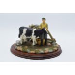 Boxed Regency Fine Arts tableau The Milking on wooden plinth. In good condition with no obvious