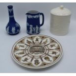 A collectioon of Wedgwood dip blue Jasperware to include a bud vase, a creamer, a white hunting