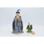 A pair of Hap Henrikson resin Wizards and Dragons figure to include a pair of wizards (2). Tallest