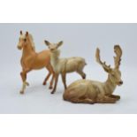 Beswick animals to include Doe 999A, stag sitting 954 and matte palomino prancing Arab 1261 (3).
