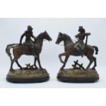 A pair of painted spelter horsemen figures each with weapons (af) mounted on wooden bases. 27cm