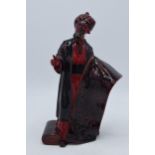 Royal Doulton Flambé figure Carpet Seller HN2776 (slight damage to thumb). In good condition with no