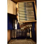 A collection of silver plated cutlery sets to include 2 cased silver-handled sets amongst the plated