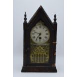 An American wooden Steeple mantle clock by Jerome & Co with Gothic design. Untested though key