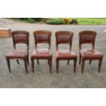 A collection of late 19th / early 20th century wooden and leather chairs (4). 89cm tall. Generally