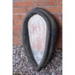 An unusual black leather horse collar repurposed as mirror. 63cm tall.