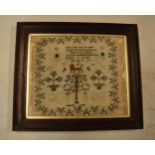A mid 19th century framed sampler by Elizabeth Lomas which starts 'May I from every sin