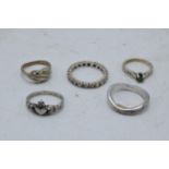 A collection of silver and white metal ladies rings, some with stones (5). 13.9 grams gross weight.
