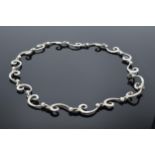 Silver ornate collar. 38.9 grams. 41cm long.