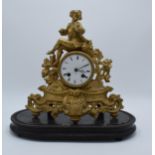 A late 19th / early 20th century Hemart ornate gilt mantle clock. 30cm tall. Untested.