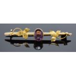 9ct gold bar brooch set with amethyst stone and base metal pin. 1.1 grams.