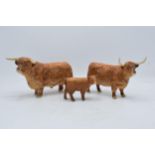A Beswick family group of Highland cattle to include Bull 2008, Highland Cow 1740 and Highland