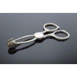 A pair of scissor-style silver sugar nips. 16.8 grams.