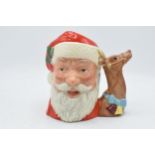 Large Royal Doulton character jug Santa Claus D6675 with Reindeer handle. In good condition with