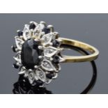 9ct gold ladies sapphire and diamond ring. 4.1 grams. UK size R.