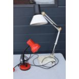 A vintage adjustable Anglepoise lamp in white with a square base together with a smaller similar red