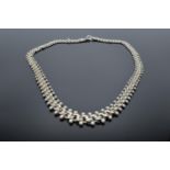 Silver inter-twined necklace. 32.1 grams. Approx 48cm long.