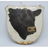 An original vintage butcher's advertising transfer Aberdeen Angus head on painted metal shield-