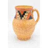 Crown Ducal by Charlotte Rhead large single-handled jug with geometric design. 22cm tall. In good