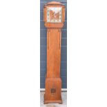 An art deco oak cased granddaughter clock by Haller. 140cm tall. Untested.