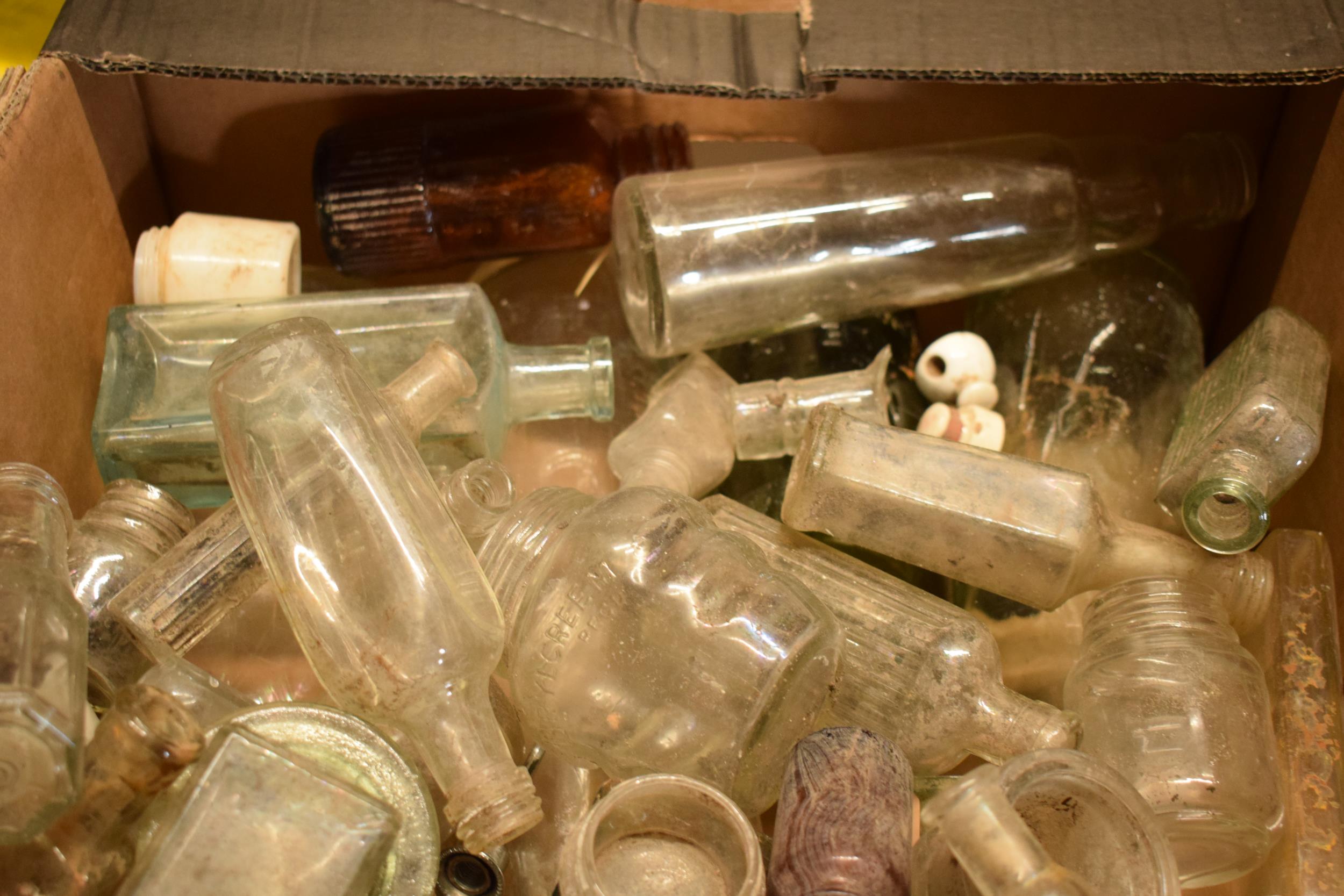 A large collection of glass bottles of varying forms and colours with some having advertising - Image 2 of 4