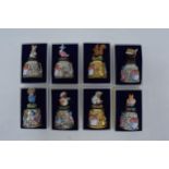 A collection of Beatrix Potter Centenary gold plated thimbles together with 6 silver plated