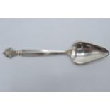 Georg Jensen: Sterling silver spoon of triangular form with full hallmarks to reverse. 15cm long.