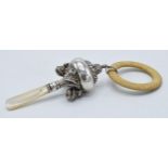 Silver children's rattle and teething ring, London 1909.