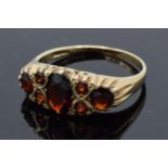 9ct gold garnet ring with approximately 1ct of garnet. 2.8 grams. Size Q.